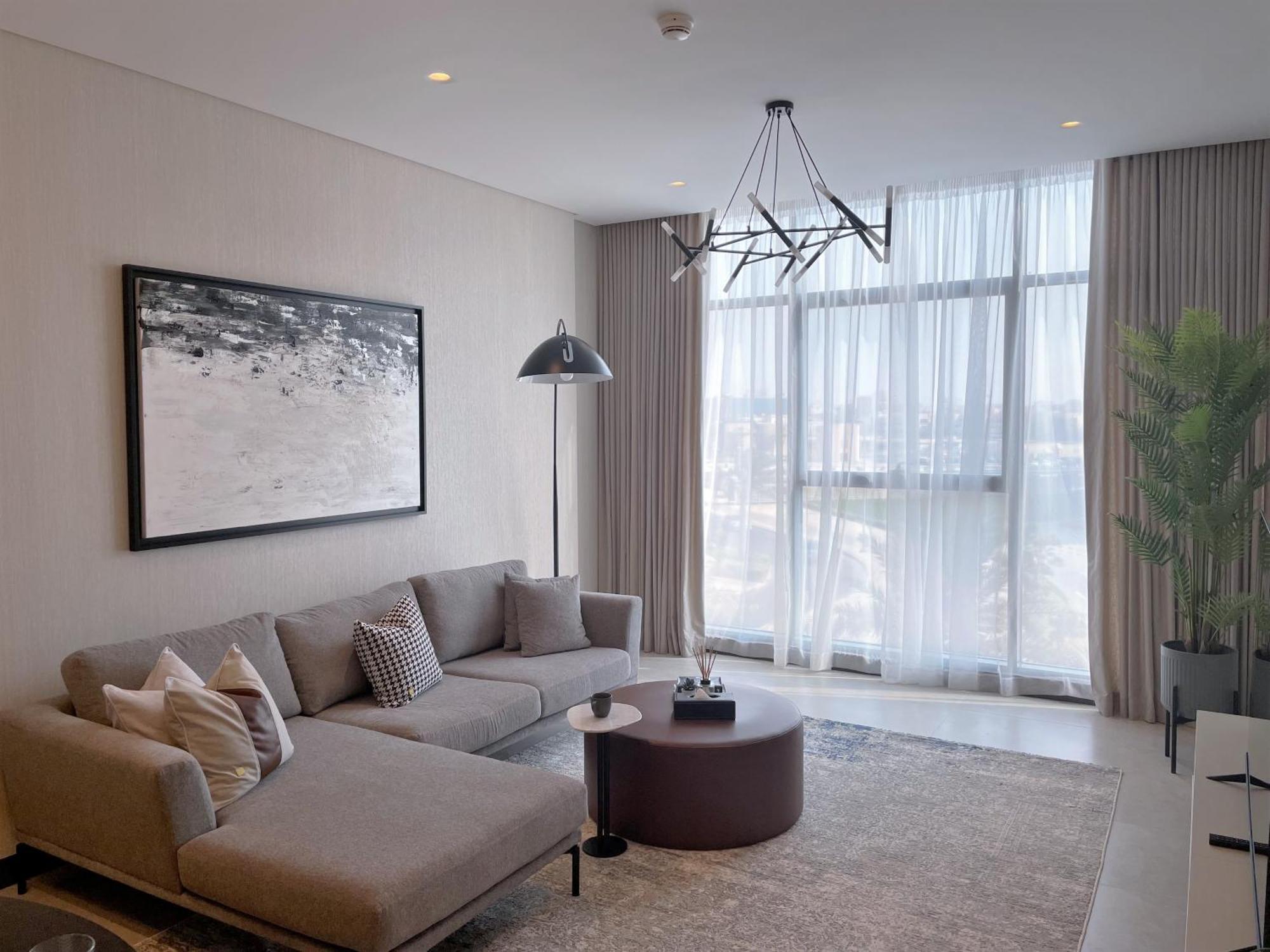 Charthouse Bahrain Hotel Manama Luaran gambar A living room in a typical apartment